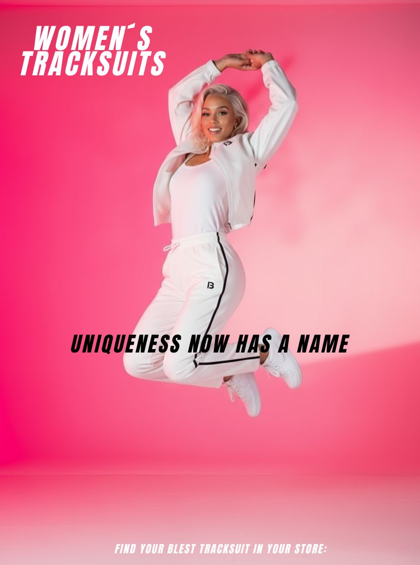 A Woman Wearing A White Blest Tracksuit