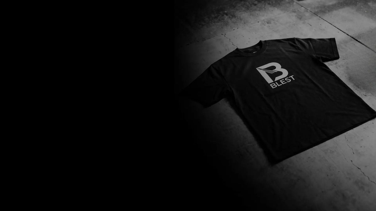 A Blest T-shirt laying on the floor