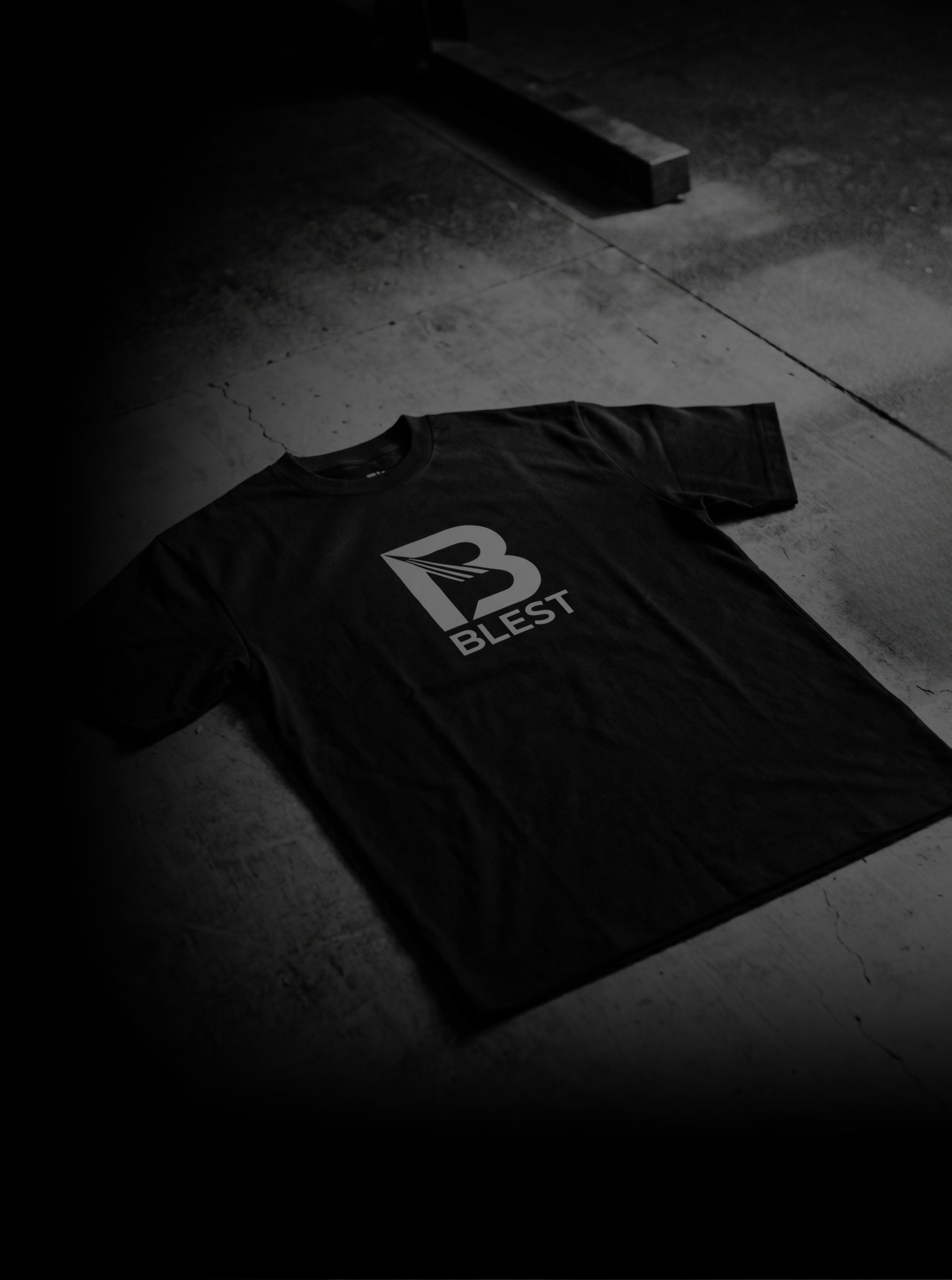 Blest t-shirt laying on the floor