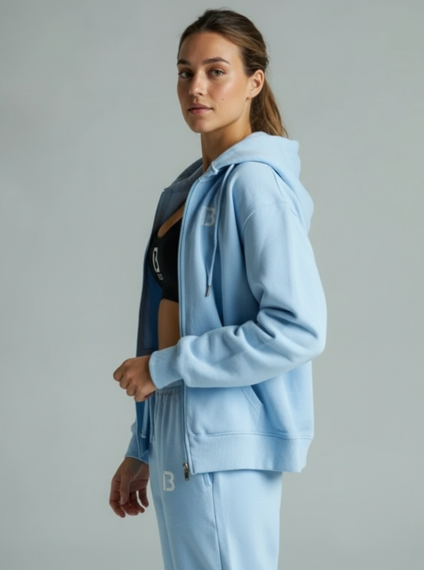 Woman Wearing the Blest Outsider Tracksuit - Side Pose